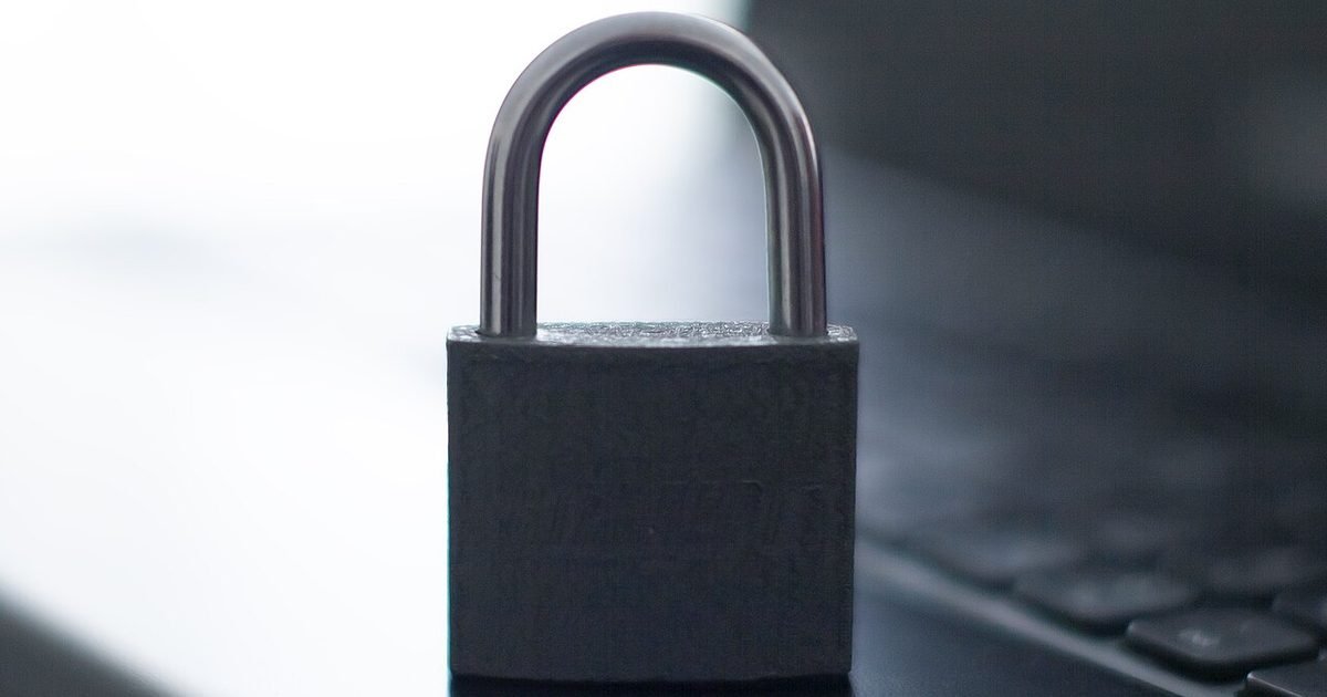 Padlock in front of a laptop symbolising meeting data privacy controls