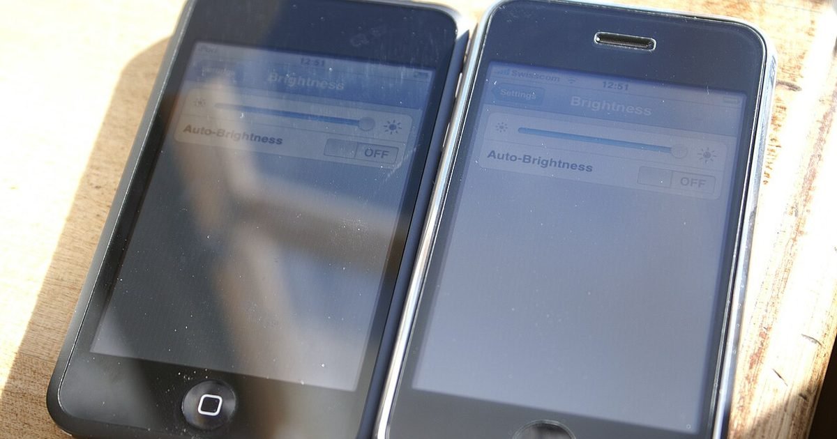Two phones with matte screen protectors, illustrating physical privacy screen trade-offs