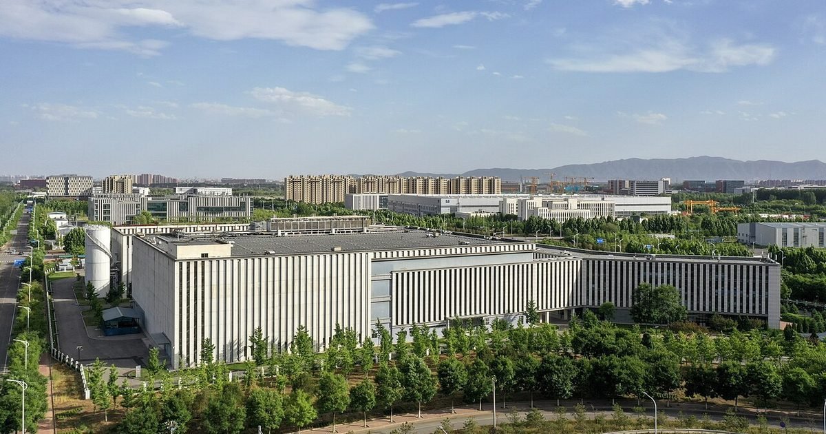 Large data center buildings representing cloud backup storage