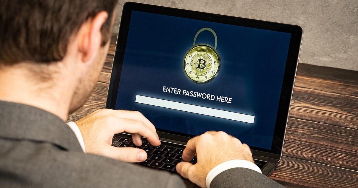 Laptop screen showing a password prompt