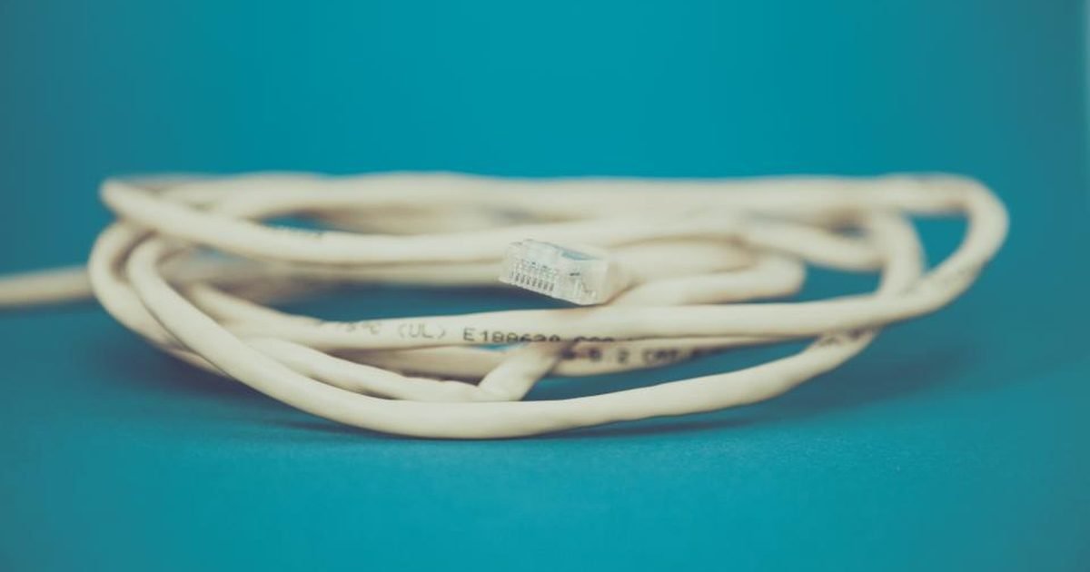Ethernet cable for wired backhaul to improve Wi-Fi coverage in a problem room